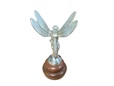 Lot 51 - Vintage chromium plated car mascot in the form of a dragonfly, later mounted on a plastic base, mascot 13cm in height (excluding base)