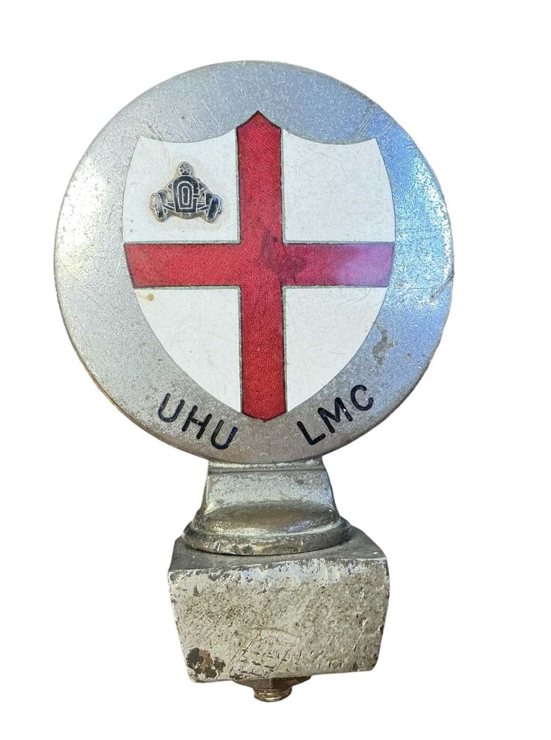 Lot 65 - Scarce vintage chromium and enamel car badge, for thr United Hospitals & University of London Motor Club, featuring a St Georges Cross, above lettering 'UHU LMC', stamped to reverse Collins, London.