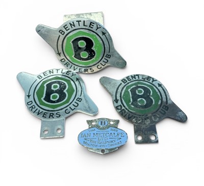Lot 69 - Group of three chromium and enamel Bentley Drivers Club car badges, together with a Bentley retailers' plaque for Ian Metcalfe Ltd (4)