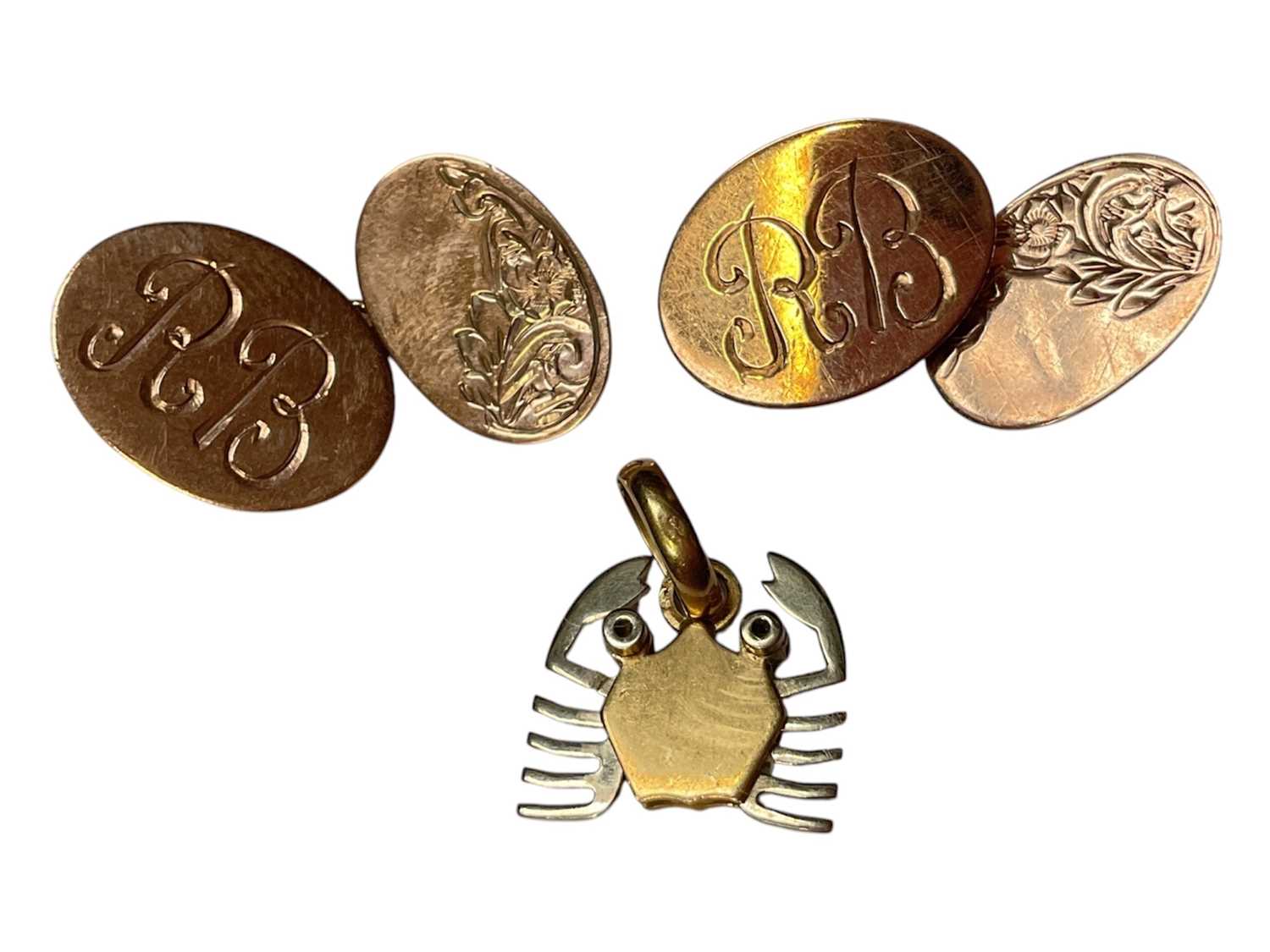 Lot 35 - Pair of 9ct rose gold cufflinks with engraved initials RB and a yellow and white metal crab pendant