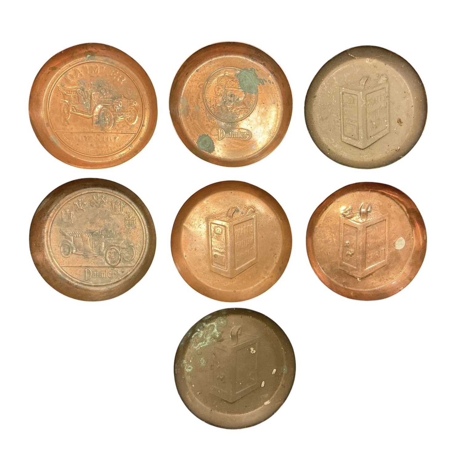Lot 96 - Group of seven early 20th century promotional copper pin dishes to include Daimler and Pratts (7)