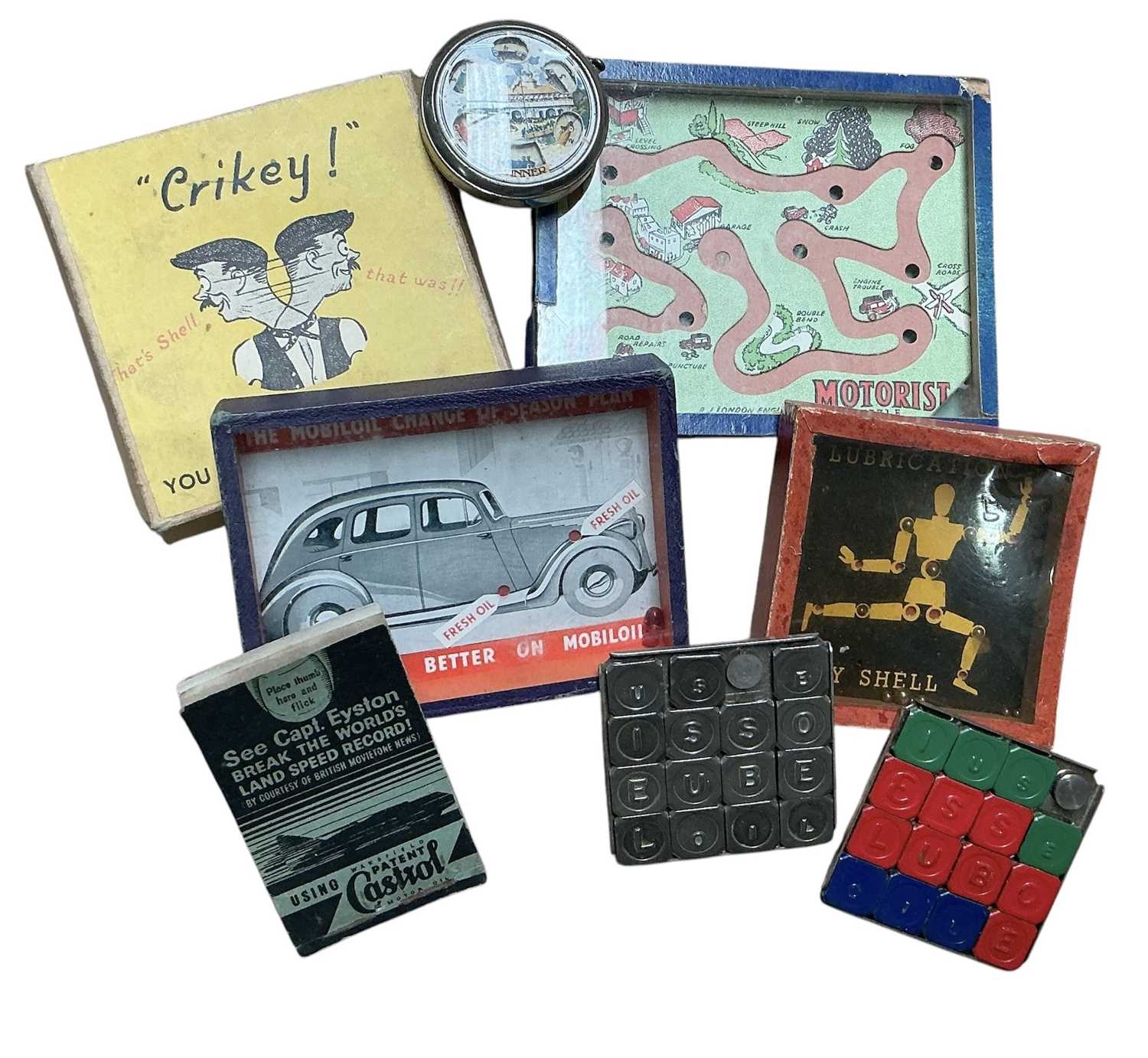 Lot 97 - Good collection of early motoring related promotional games and puzzles to include Shell Lubrication, Mobiloil, Castrol and Esso (8)