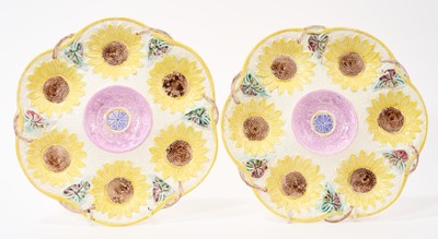 Lot Rare pair of Victorian pottery oyster plates decorated with sunflowers, possibly by Samuel Lear