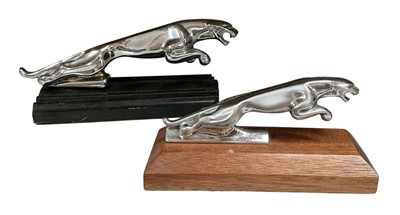 Lot 105 - Two chromium plated Jaguar Cars 'leaper' car mascots, each mounted on a wooden base, the largest 19.5cm in length