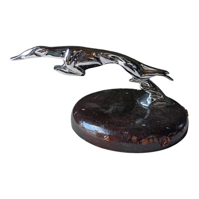 Lot 170 - Vintage chromium plated car mascot in the form of a stylised greyhound, mounted on base