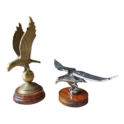 Lot 171 - Brass car mascot in the form of a bird, together with another chromium plated car mascot in the form of a bird (2)