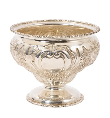 Lot 309 - George III style silver pedestal bowl with repoussé decoration, by Robert Chandler