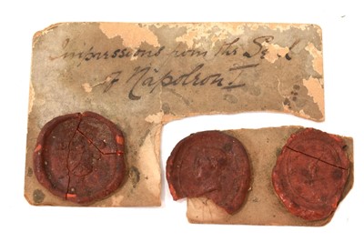 Lot 763 - Group of 18th / 19th century wax seals mounted onto a card inscribed in pen impressions from the seal of Napoleon I