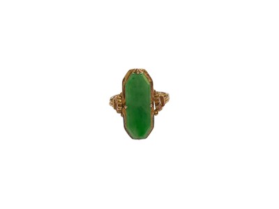 Lot 92 - Chinese yellow metal jade / green hardstone panel ring, stamped 14k, size L