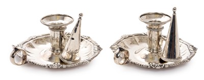 Lot 225 - Pair of George III silver chamber candlesticks by Edward Wakelin