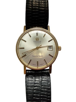 Lot 73 - Tissot Visodate Seastar Seven gold cased wristwatch on black leather strap. Case diameter 33mm