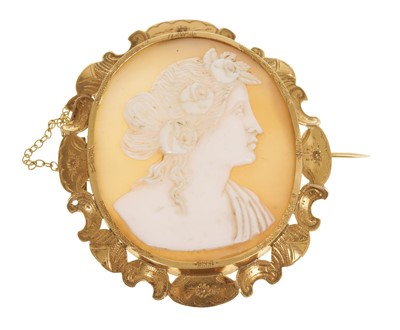Lot 471 - Antique carved shell cameo depicting a classical female bust with roses in her hair, in a Dutch gold brooch mount