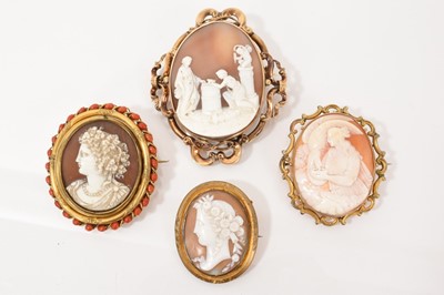 Lot 472 - Four antique carved shell cameo brooches