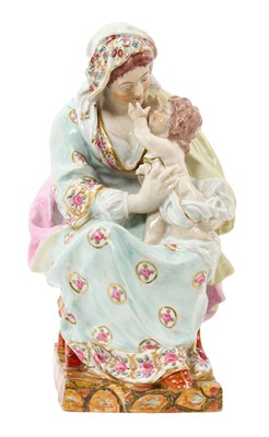 Lot 19th century pearlware glazed group of the Madonna and child, after a model by Enoch Wood, polychrome painted on a marbled base, 31cm high