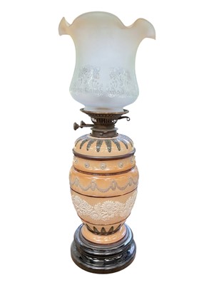 Lot 131 - Doulton stoneware oil lamp