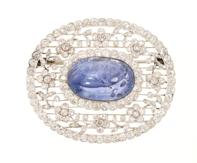 Lot Fine Edwardian Belle Époque cabochon blue sapphire and diamond oval plaque brooch