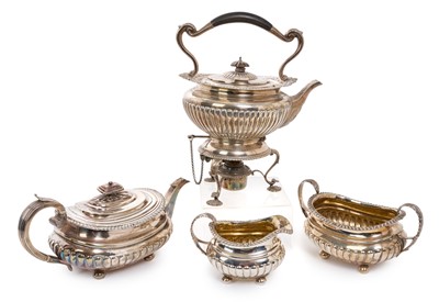 Lot 262 - George III Scottish silver three piece silver teaset and a separate spirit kettle on stand