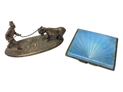 Lot 285 - Art Deco silver and enamelled compact, together with a silver plated model of a farmer and donkey