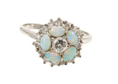 Lot 417 - Opal and diamond cocktail ring with five oval opal cabochons and brilliant cut diamonds in white gold setting