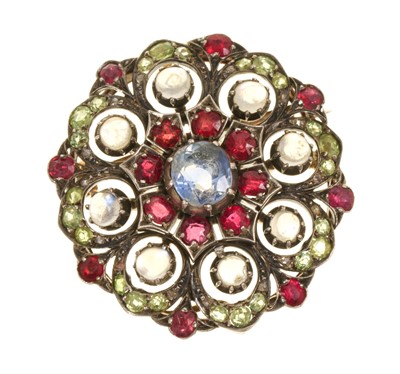 Lot 408 - Victorian multi-gem cluster brooch / pendant, the circular pierced plaque with a central cornflower blue sapphire, surrounded by garnets, moonstones, peridots and rose cut diamonds