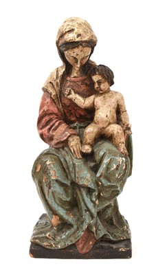 Lot 729 - Continental carved and polychrome painted wooden figure of Mary and Jesus