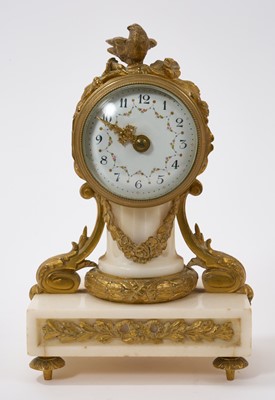 Lot 653 - Late 19th / early 20th century French desk clock with painted floral swag dial, French cylinder movement in ormolu and white marble case mounted with a finch, 19cm high. With key