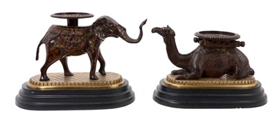 Lot 710 - Pair of unusual Regency style bronzed stands, in the form of an elephant and a camel