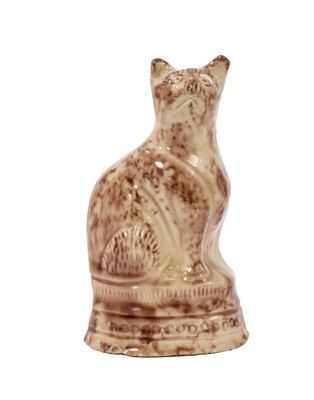 Lot 99 - Late 18th century creamware cat with Whieldon type glaze