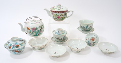 Lot 112 - Group of Chinese Republic period polychrome painted porcelain, including two teapots and covers, pair of rice bowls and covers, a pair of rice bowls, covers and stands, and a Doucai-style rice b...