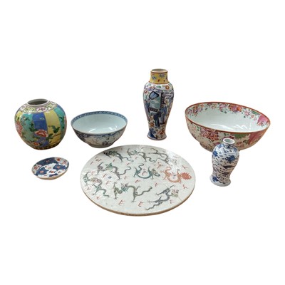Lot 117 - Group of 18th and 19th century Chinese porcelain, including a large circular panel painted with dragons, large famille rose bowl, clobbered blue and white vase, etc (7)