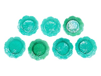 Lot 122 - Group of seven Wedgwood green majolica leaf shaped plates, impressed marks, 20cm diameter