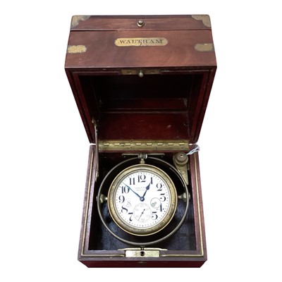 Lot 669 - Early 20th century Waltham Watch Co. brass bound mahogany ships chronometer