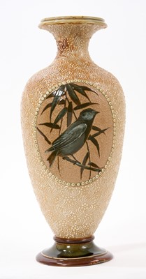 Lot 132 - Florence Barlow for Doulton Lambeth, baluster vase painted with perched birds in oval panels, on a seaweed enamelled ground, impressed and incised marks, 25cm high