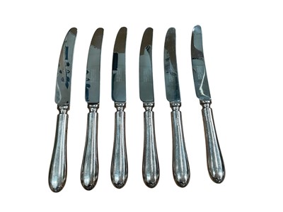 Lot 327 - Set of six contemporary dessert / starter table knives with silver handles and stainless steel blades, (6).