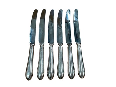 Lot 328 - Set of six contemporary silver dinner knives with silver handles and stainless steel blades, (6).