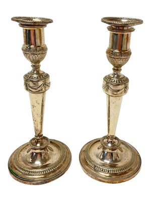 Lot 310 - Pair of silver plated candlesticks
