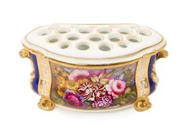 Lot 139 - Bloor Derby bough pot, circa 1830, polychrome painted with a floral bouquet, on a cobalt blue and gilt ground, scroll handles and feet, stamped mark to base