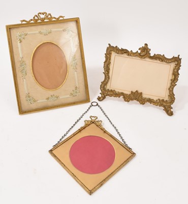 Lot 745 - Highly decorative group of 19th century and later ormolu photo frames, the largest a rectangular frame with ribbon cresting, 25 x 18cm