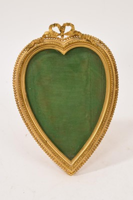 Lot 744 - 19th century ormolu photo frame, of heart shaped form, 18 x 13cm