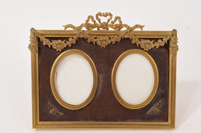 Lot 742 - 19th century ormolu double photo frame, with classical swags, 14 x 16.5cm