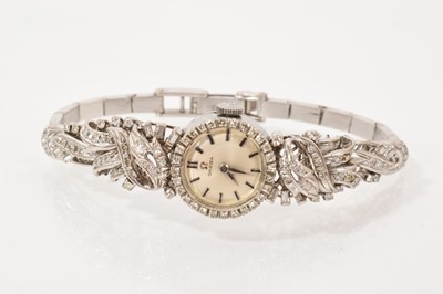 Lot 513 - 1960s ladies cocktail watch with Omega movement in diamond-set white metal case on bracelet