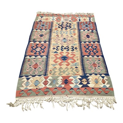 Lot 5419 - Kilim rug with geometric decoration on red, blue, cream, and green ground, 178cm x 114cm
