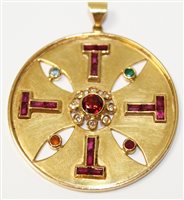 Lot 3293 - 1980s gold (18ct) Aztec-style pendant, set...