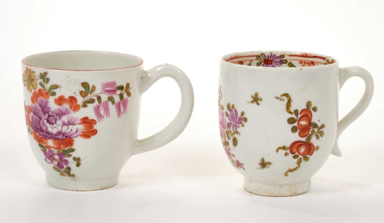 Lot 157 - Two 18th century Lowestoft coffee cups with polychrome painted floral sprays