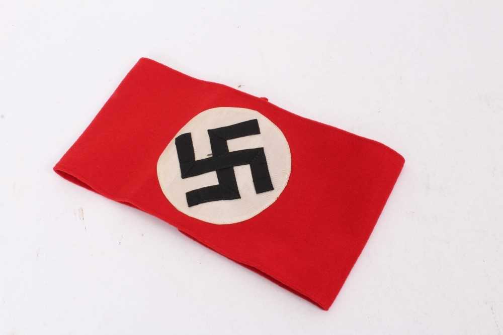 Lot 553 - Nazi party arm band with RZM paper label to interior - numbered 344698