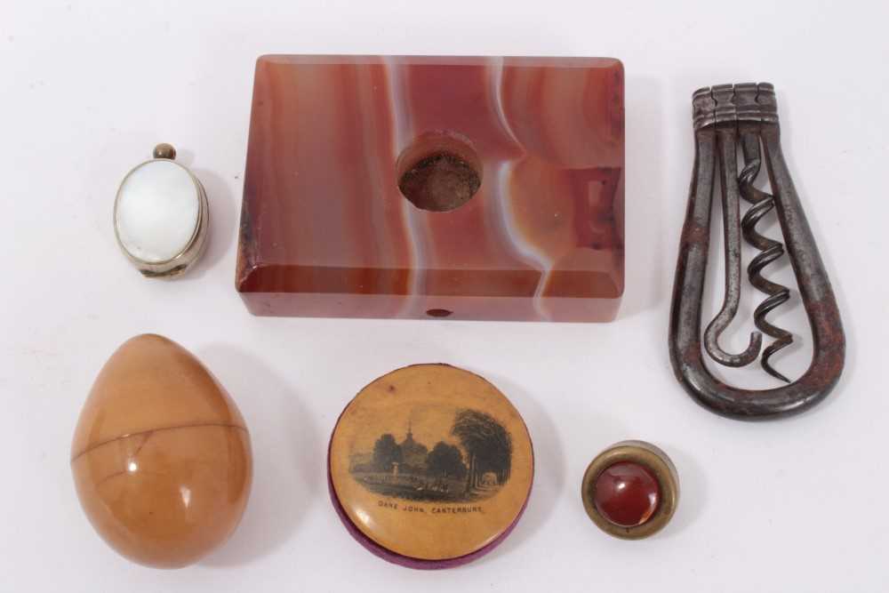Lot 1139 - Mixed lot to include Agate bell-push, Mauchline pin cushion-canterbury scene, miniature compass, coquilla egg and a folding corkscrew (5)