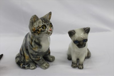 Lot 2085 - Four Winstanley china cats