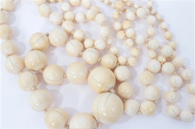 Lot 738 - Antique ivory bead necklace with a string of 119 graduated ivory beads ranging from 3.75mm - 23mm. Length 137cm.