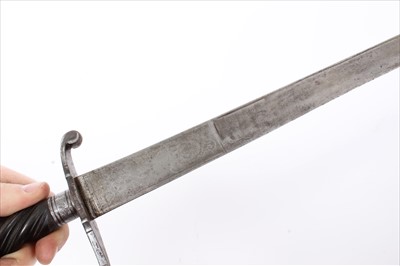 Lot 727 - 18th century French hunting sword with spiral twist ebony hilt, recurving cross guard and etched fullered blade. 72cm overall .