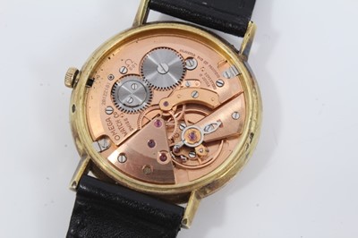 Lot 178 - 1970s gentlemens Omega Genève wristwatch with 17 jewel 601 calibre movement, the circular brushed satin dial with applied gold dart hour markers and centre seconds, in gold plated circular case, on...